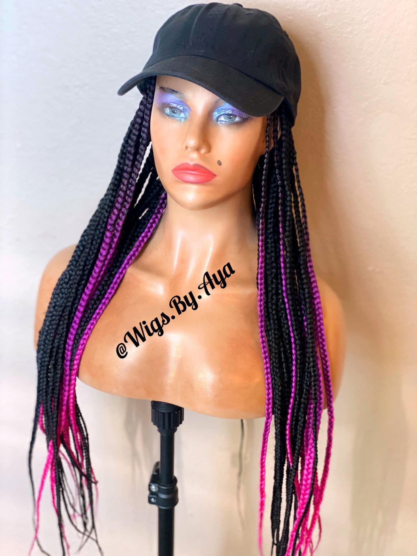 Hat braided wig.
