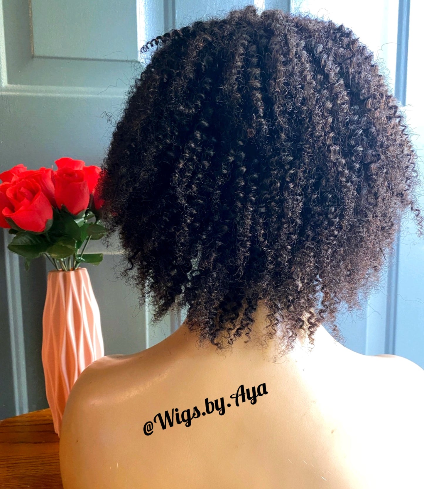 Kinky curly closure human hair wig.