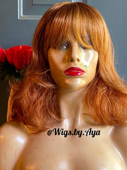 Short Bob human hair wig with bangs.