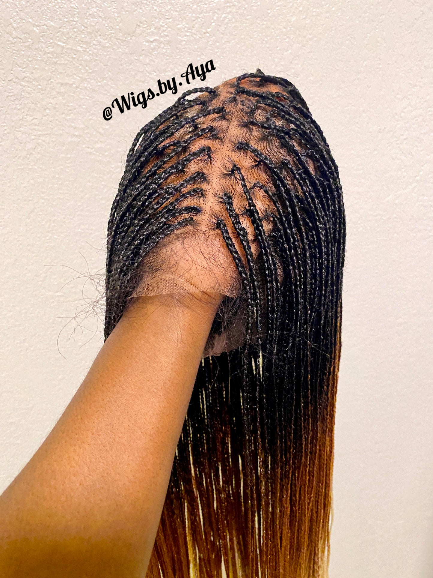 Full lace small knotless braided wig.