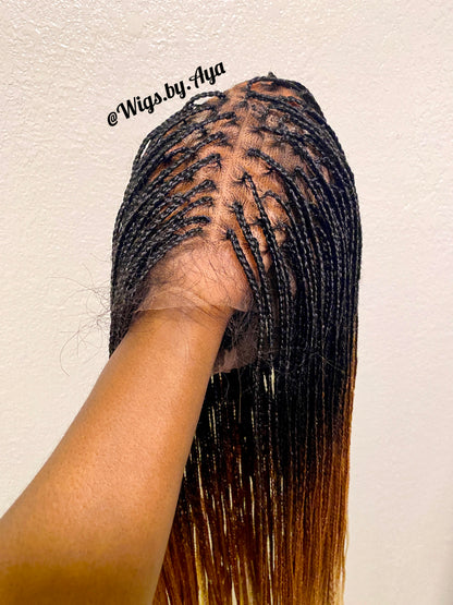 Full lace small knotless braided wig.