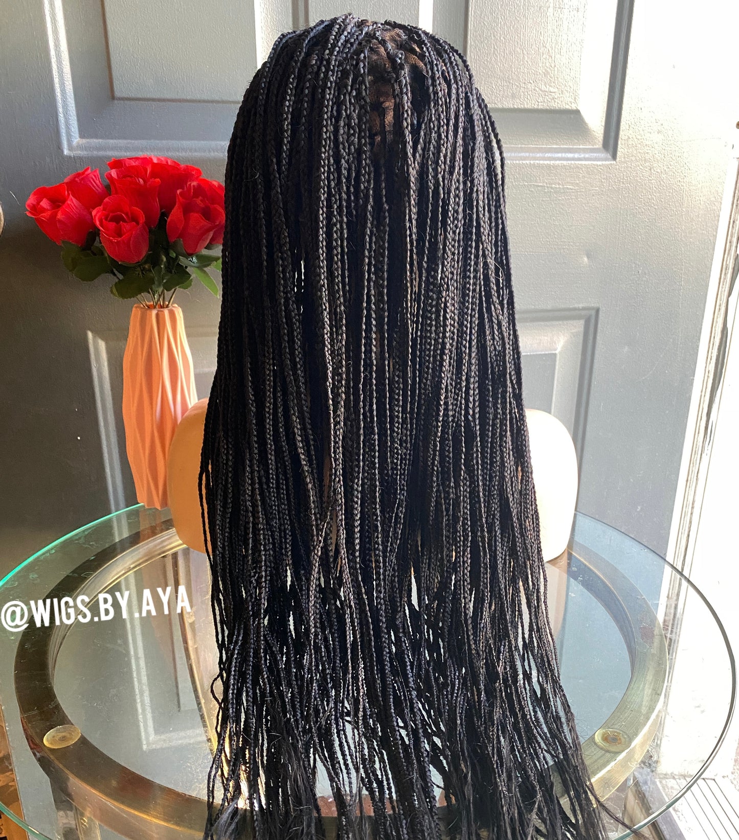 Full lace small knotless braided wig.