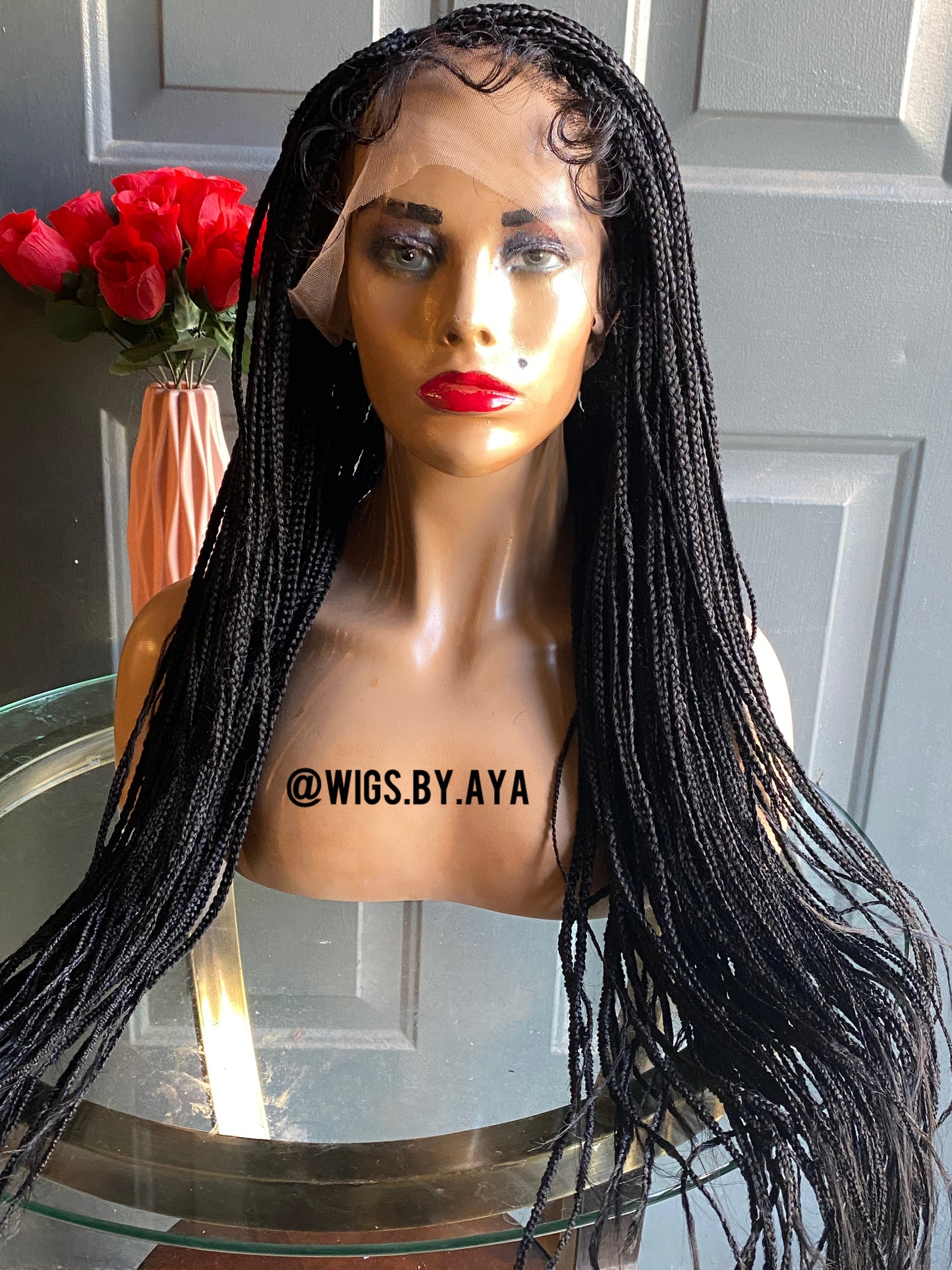 Full lace small knotless braided wig.