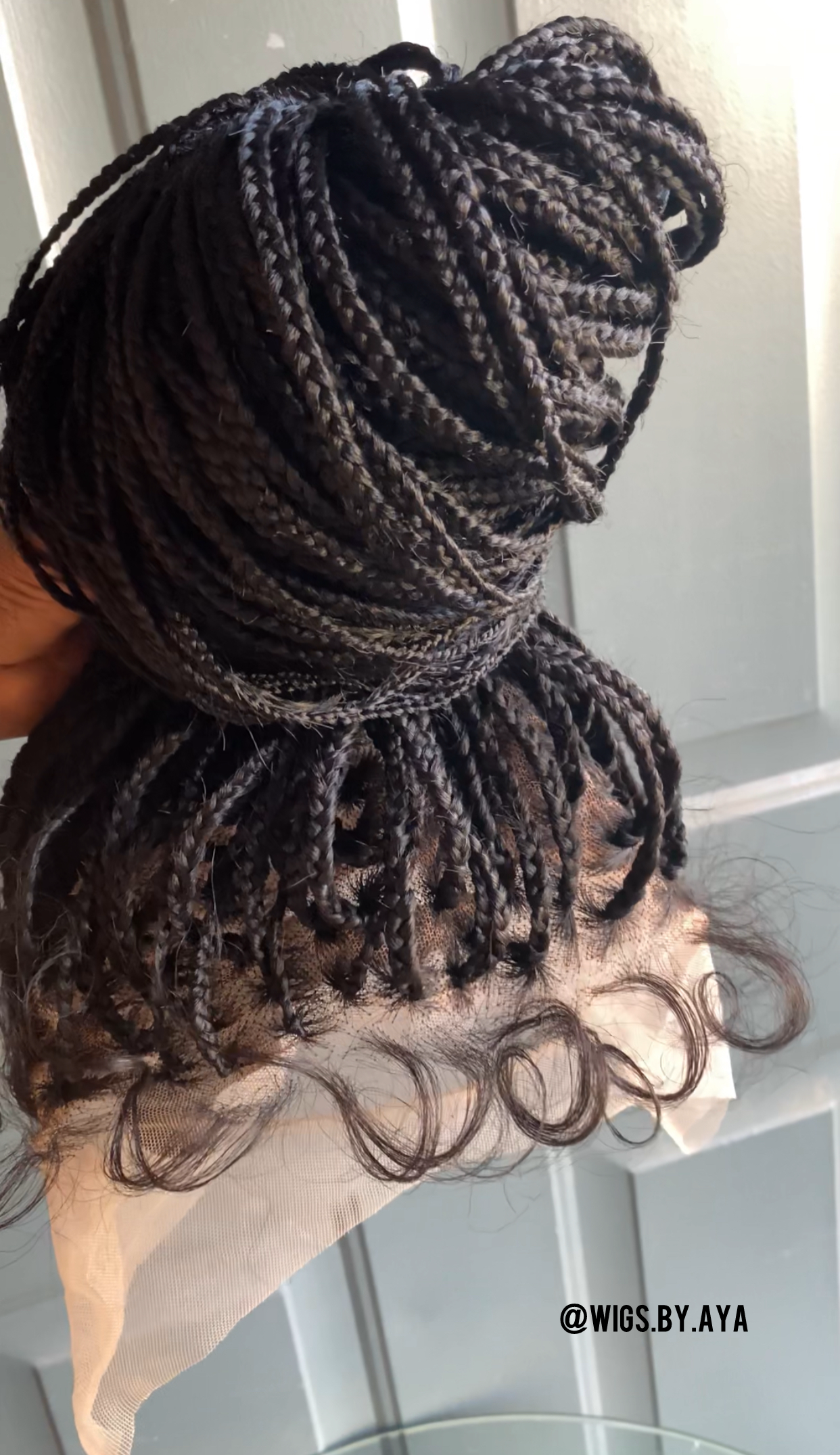 Full lace small knotless braided wig.