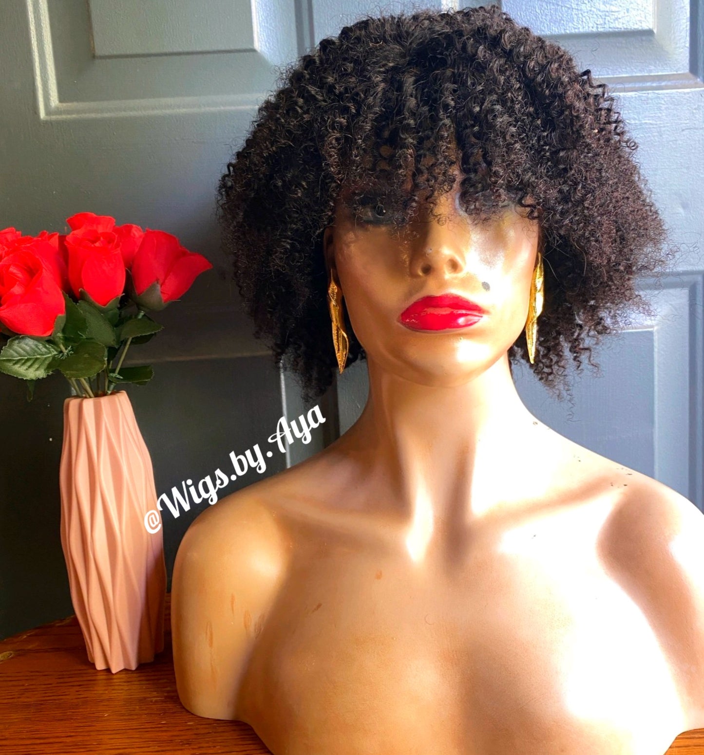 Kinky curly closure human hair wig.