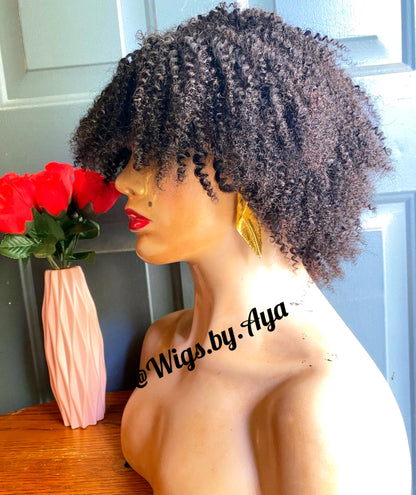 Kinky curly closure human hair wig.