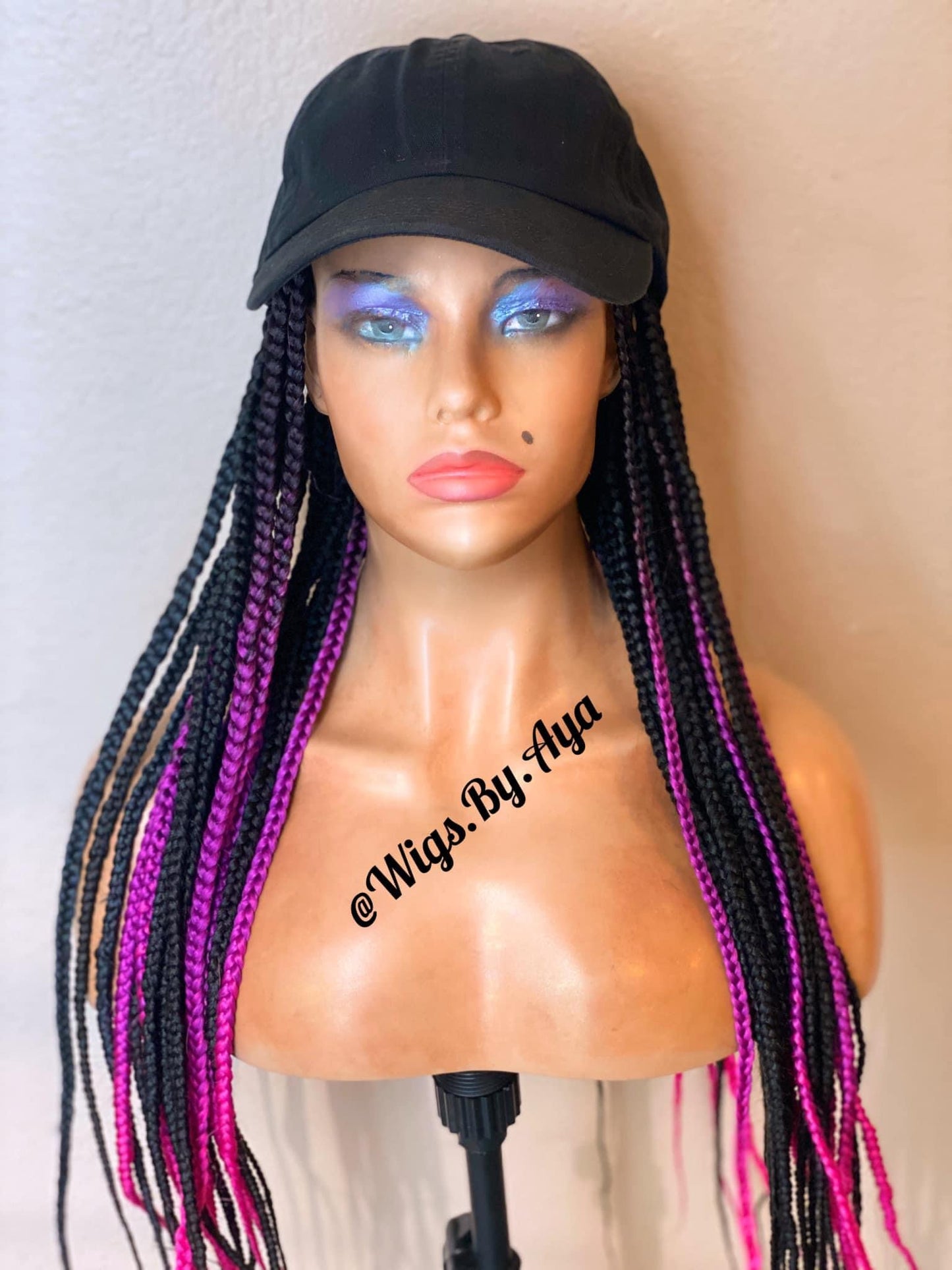 Hat braided wig.