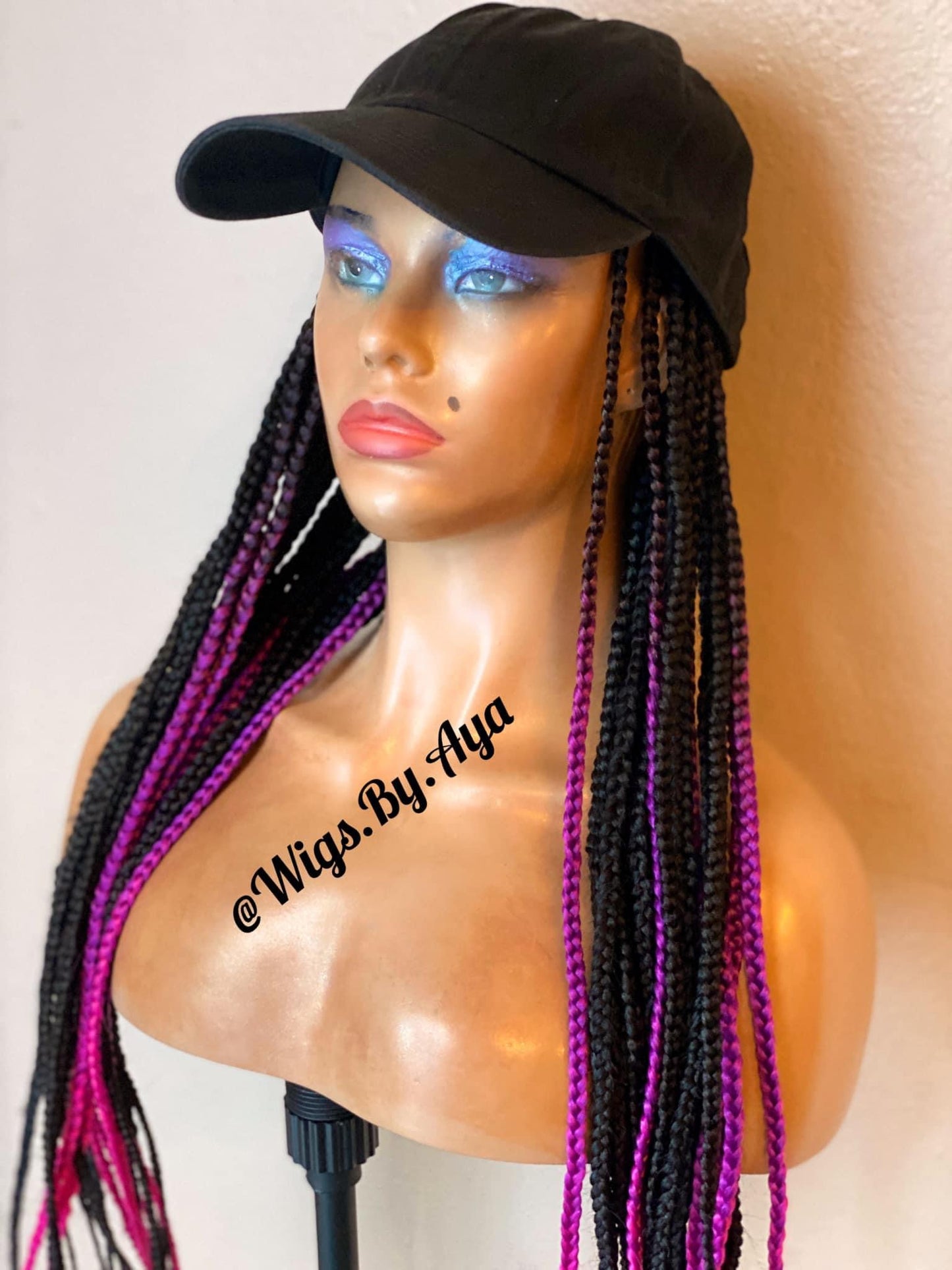 Hat braided wig.