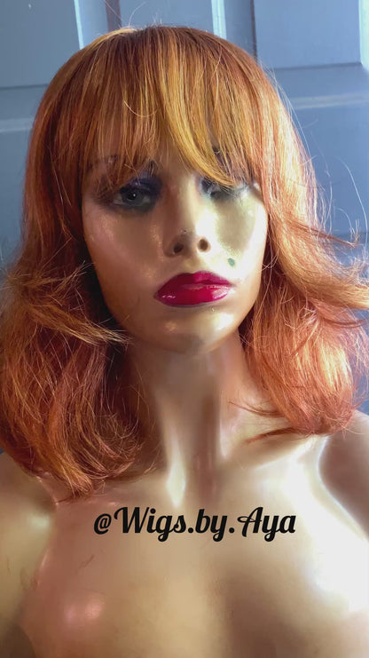 Short Bob human hair wig with bangs.